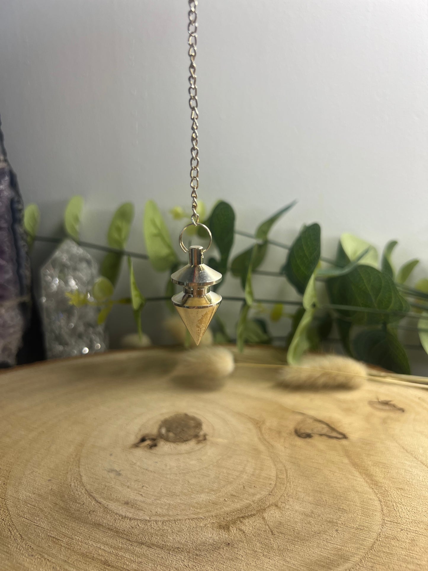 Pendule conique en métal argenté